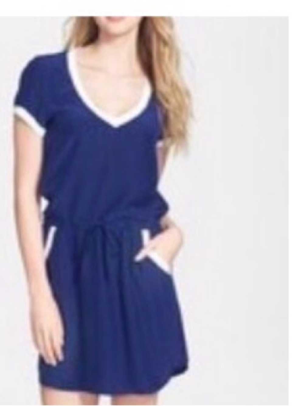 Bloomingdale’s Amanda Uprichard drawstring silk dress features a deep V-neck
